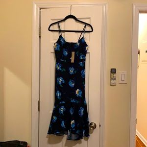 Navy floral dress. Light comfy fabric. Adjustable straps.